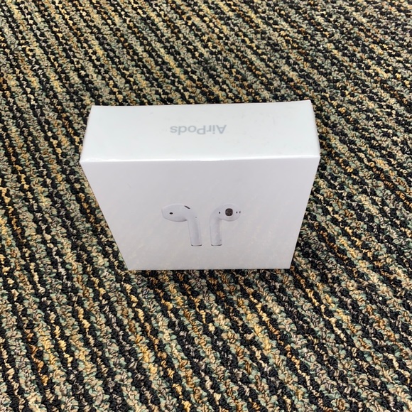 NEVER USED AIRPODS WITH CHARGING CASE